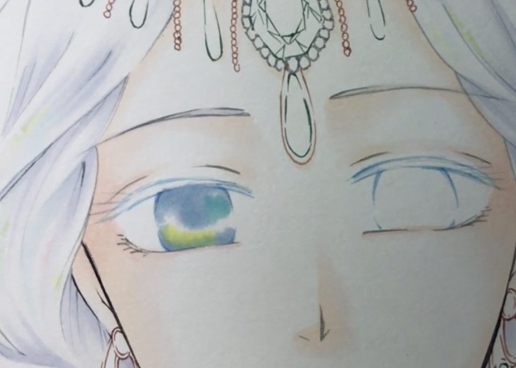 塗り残した虹彩部分にYG00・BG53を塗り、B41を重ねる