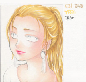 柔らかい茶系の入った金髪